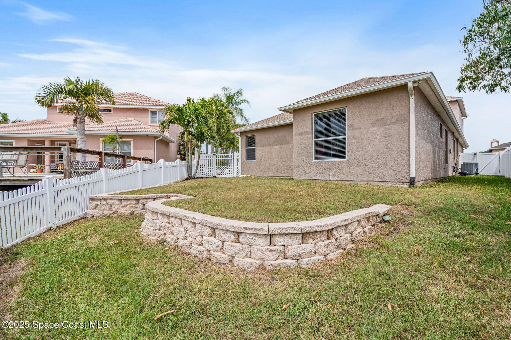 1835 Harbor Point Drive Merritt Island, FL 32952 - Photo 51 of 67 a view of a house with a swimming pool