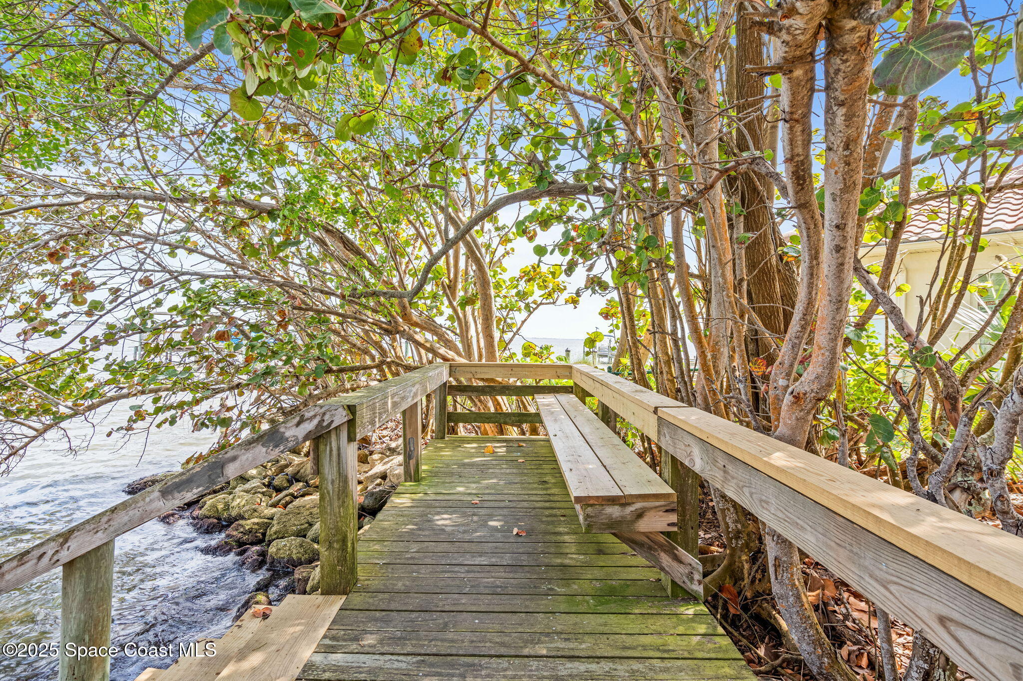 1835 Harbor Point Drive Merritt Island, FL 32952 - Photo 56 of 67 a view of balcony with wooden floor and fence