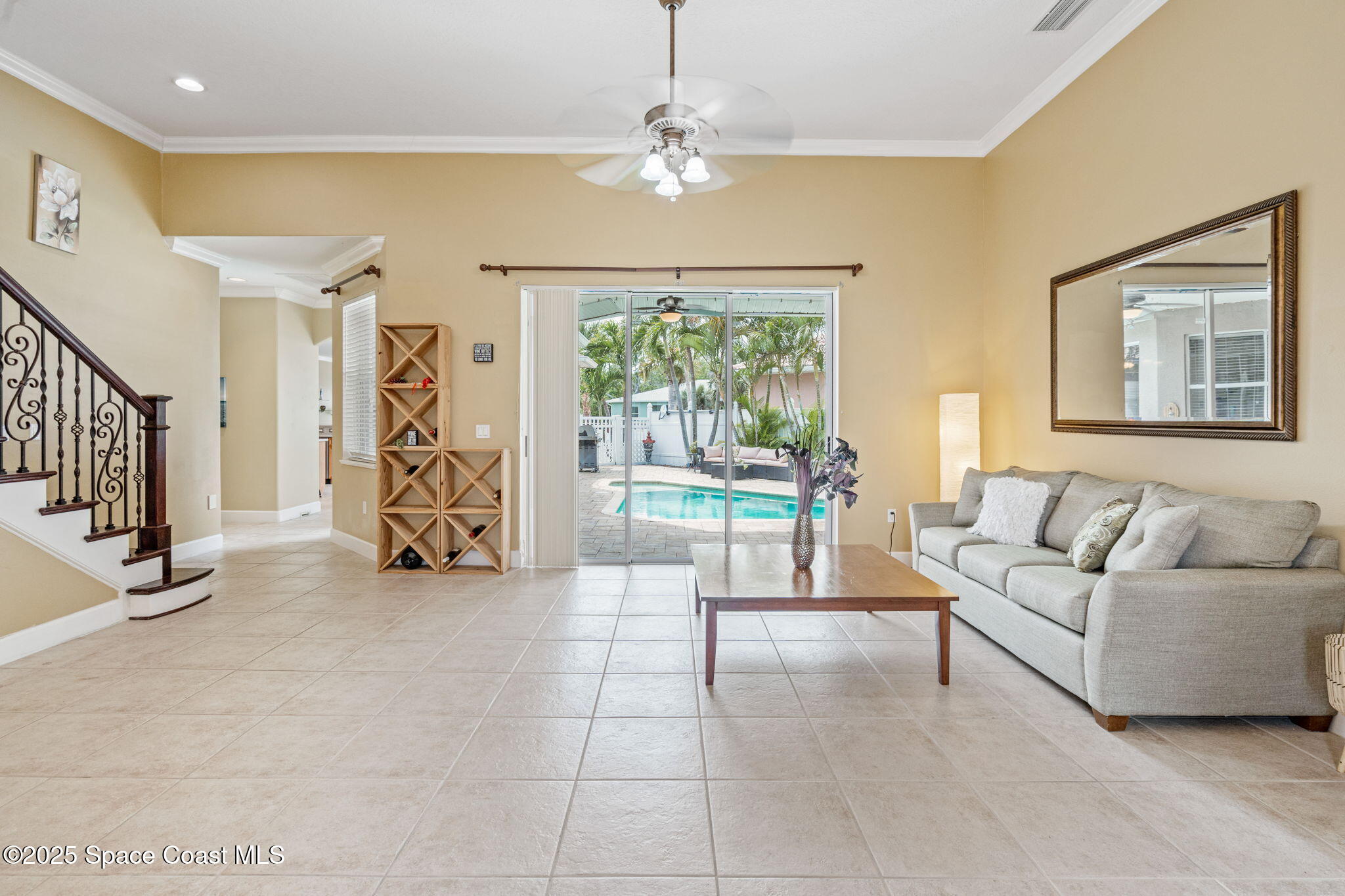 1835 Harbor Point Drive Merritt Island, FL 32952 - Photo 10 of 67 a living room with furniture and a large window