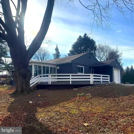 a house view with a garden space
