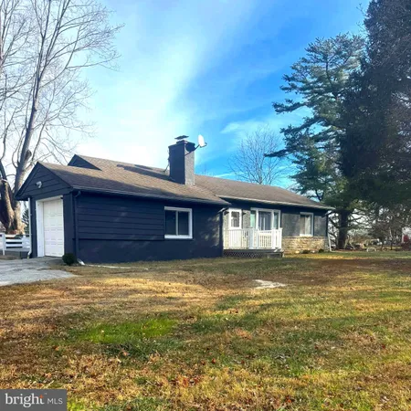 a house view with a outdoor space