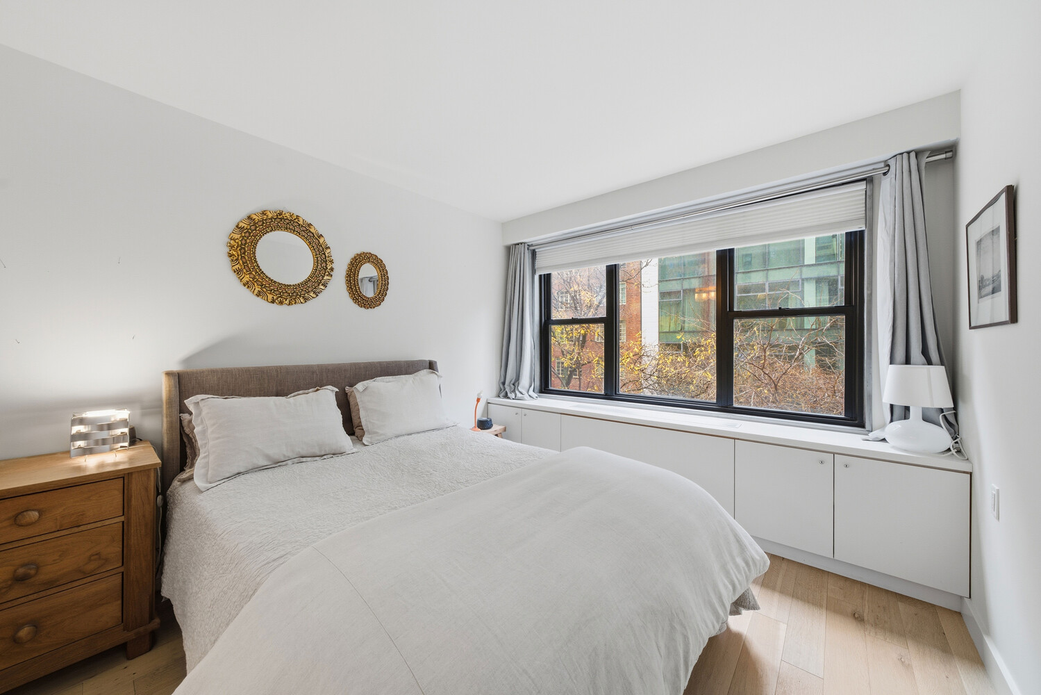 1065 Park Avenue, Unit 3C Manhattan, NY 10128 - Photo 5 of 8 a bedroom with a bed and a window