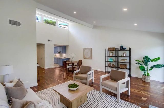 a view of a chairs and table in the patio