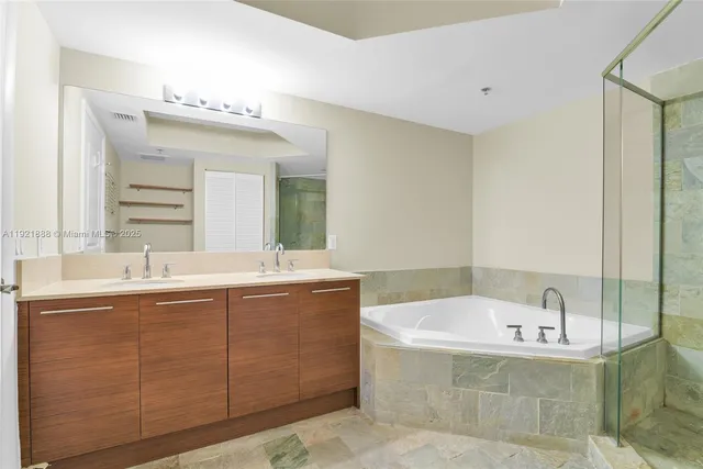 a view of hallway with washer and dryer