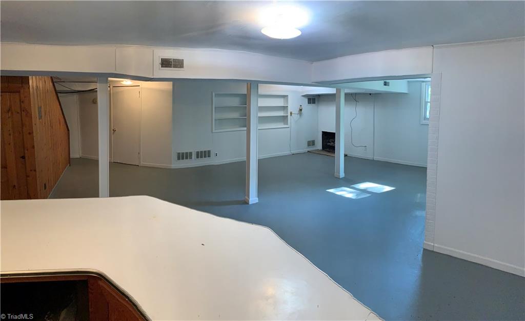 3028 Kinnamon Road Winston-Salem, NC 27104 - Photo 22 of 25 Large basement. Would make for a great playroom!