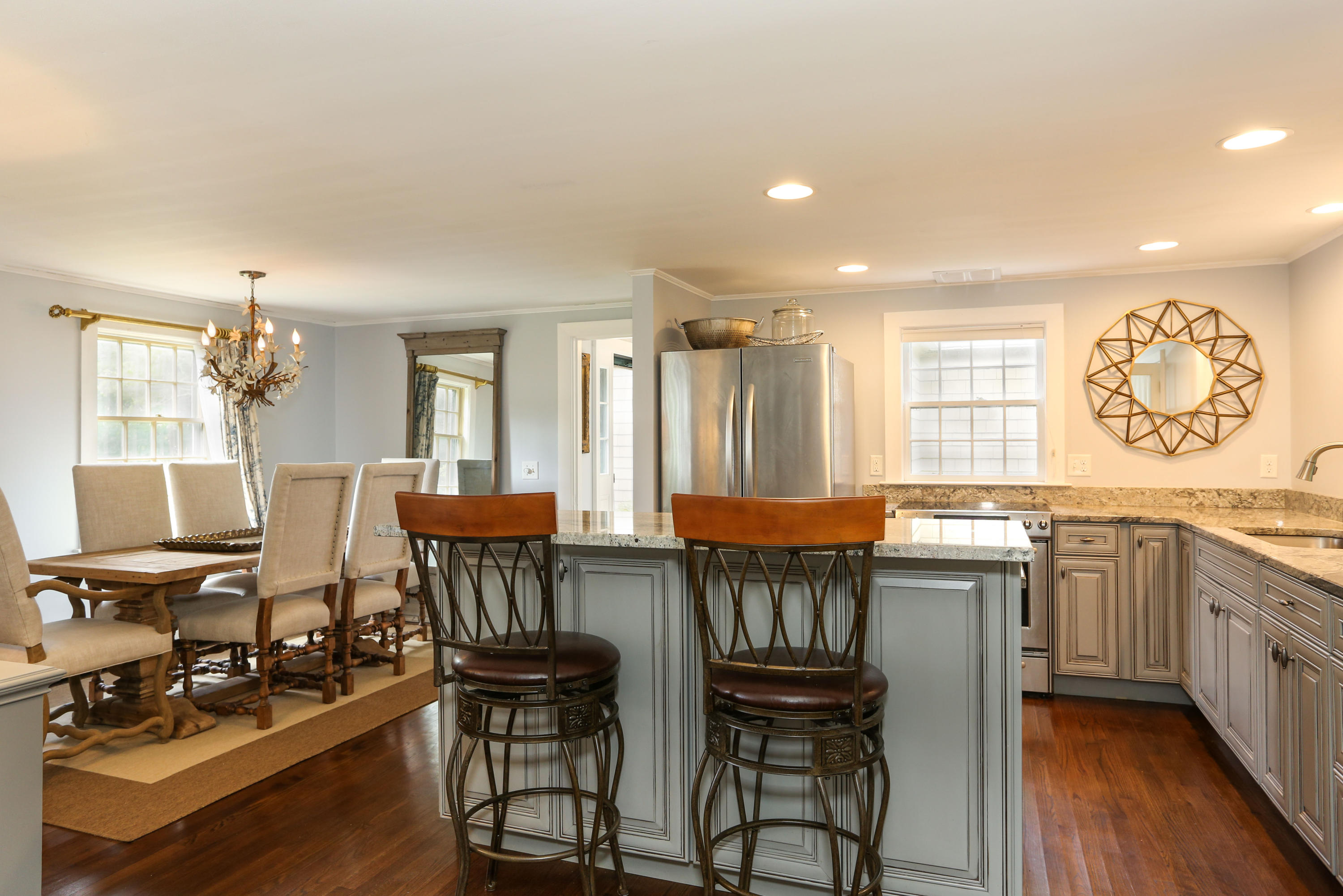 18 Sparrowhawk Road Orleans, MA 02653 - Photo 13 of 43 a view of a dining room with furniture and wooden floor