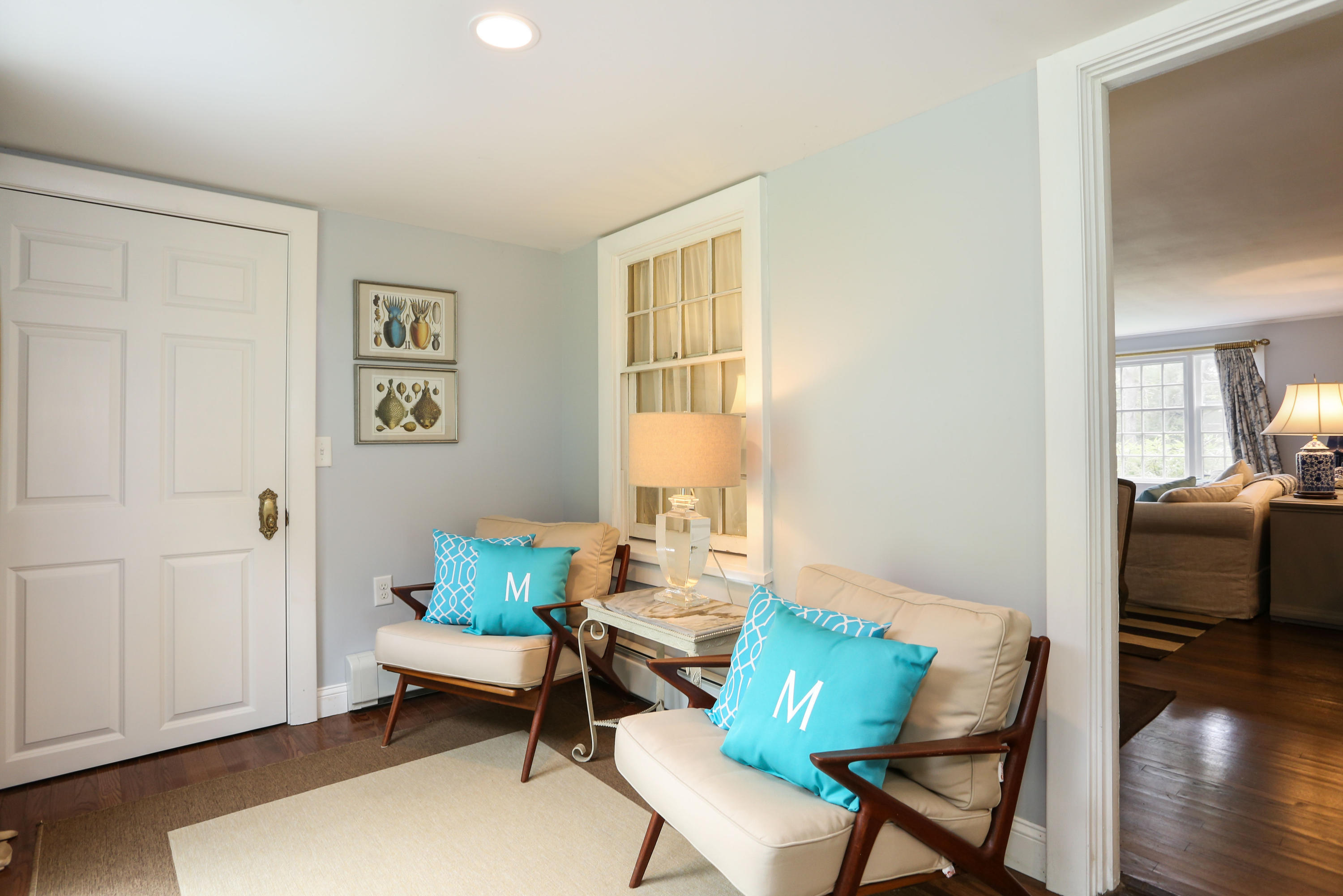 18 Sparrowhawk Road Orleans, MA 02653 - Photo 19 of 43 a living room with furniture and a wooden floor