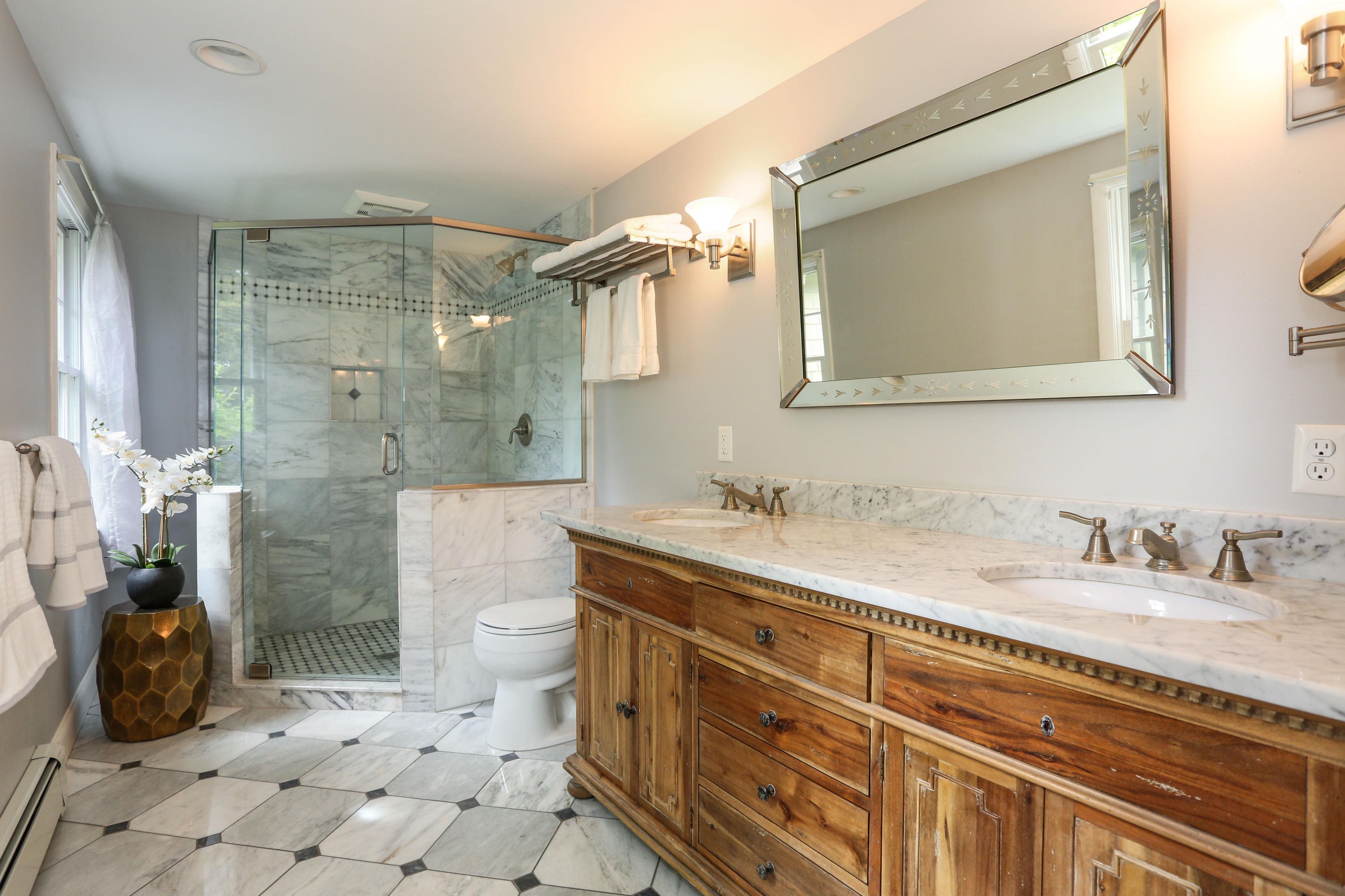 18 Sparrowhawk Road Orleans, MA 02653 - Photo 21 of 43 a bathroom with a granite countertop sink mirror and double