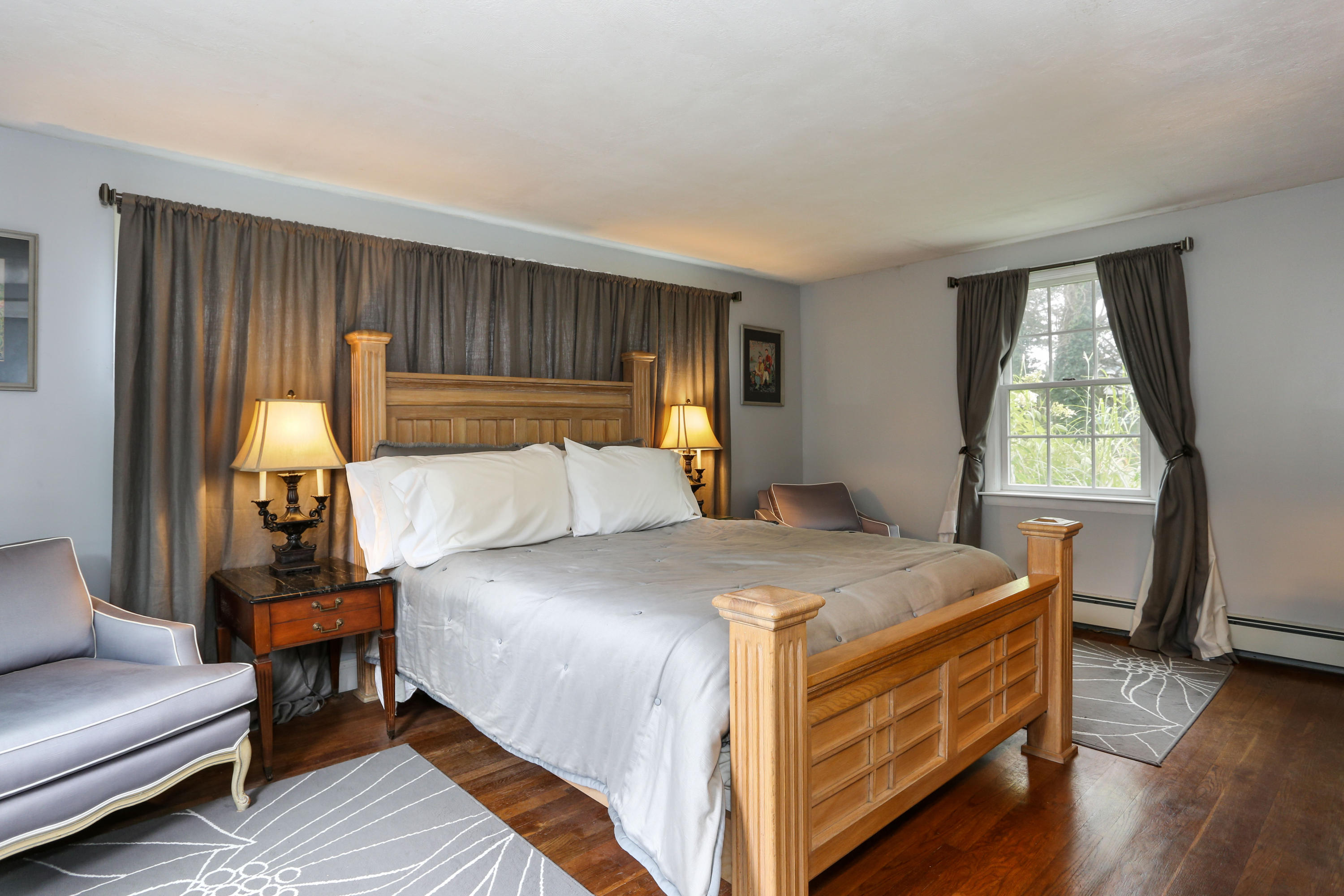 18 Sparrowhawk Road Orleans, MA 02653 - Photo 23 of 43 a bed room with a bed and a chair