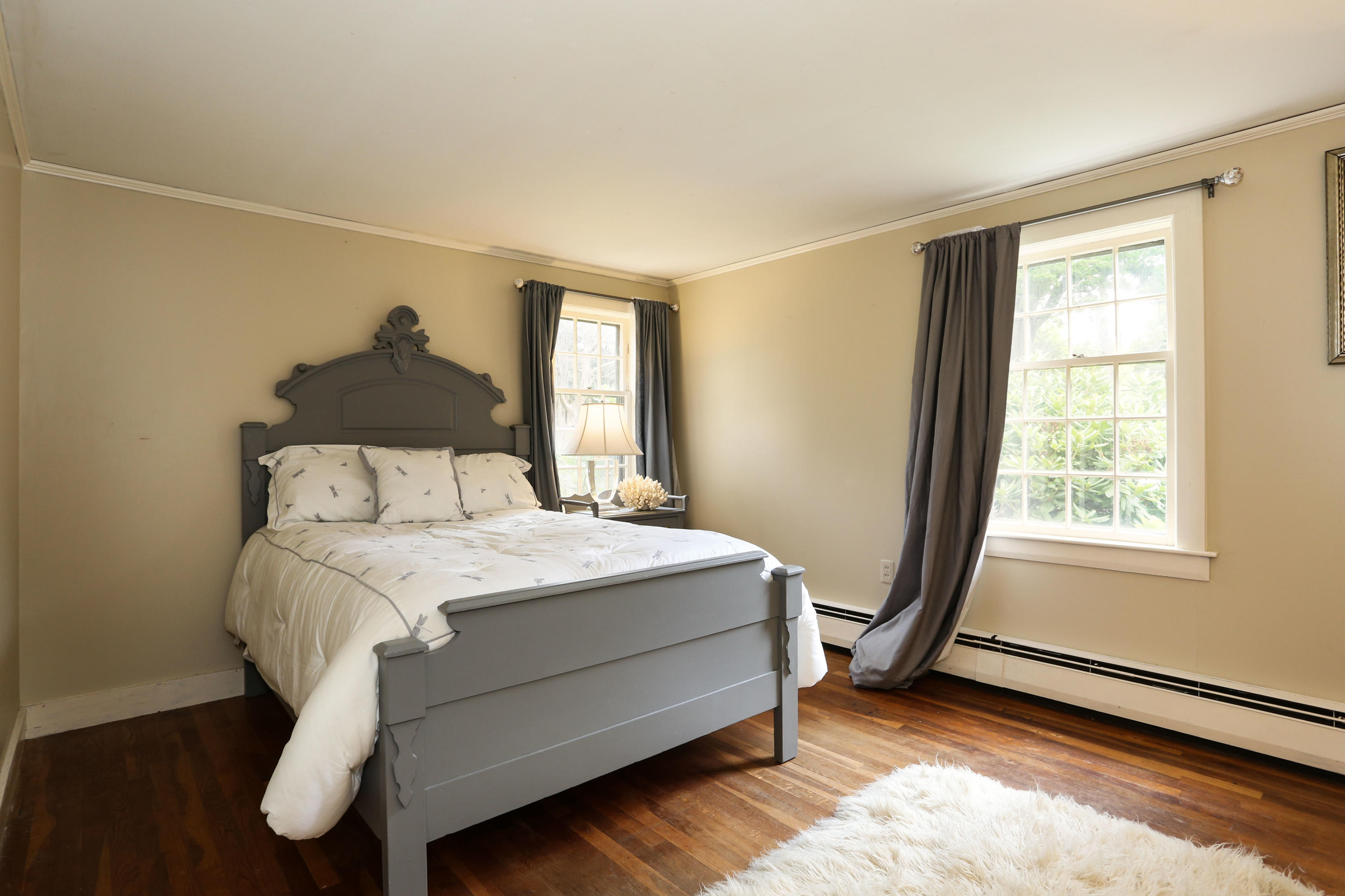 18 Sparrowhawk Road Orleans, MA 02653 - Photo 26 of 43 a bed sitting in a bedroom next to a window