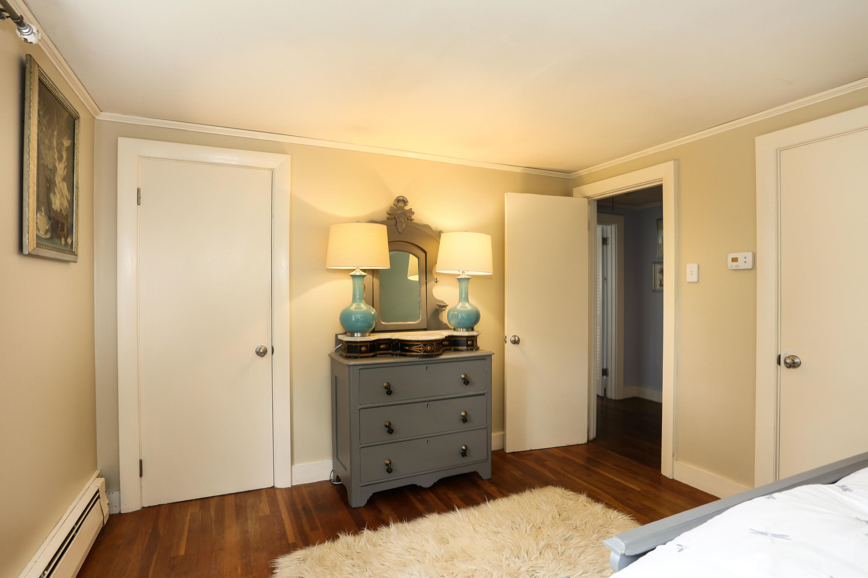 18 Sparrowhawk Road Orleans, MA 02653 - Photo 27 of 43 a view of a bedroom with wooden floor