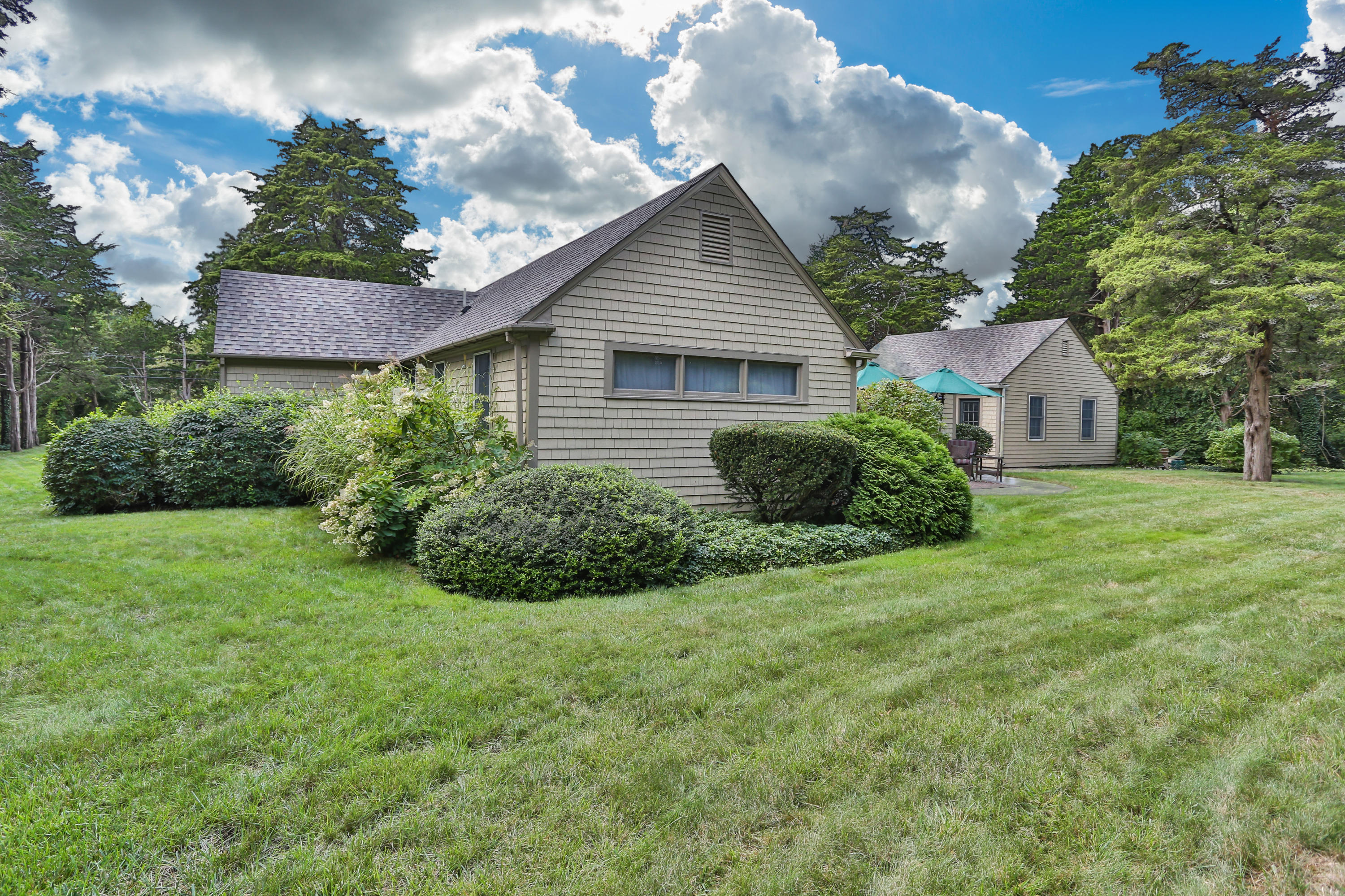 18 Sparrowhawk Road Orleans, MA 02653 - Photo 35 of 43 a view of a house with a garden