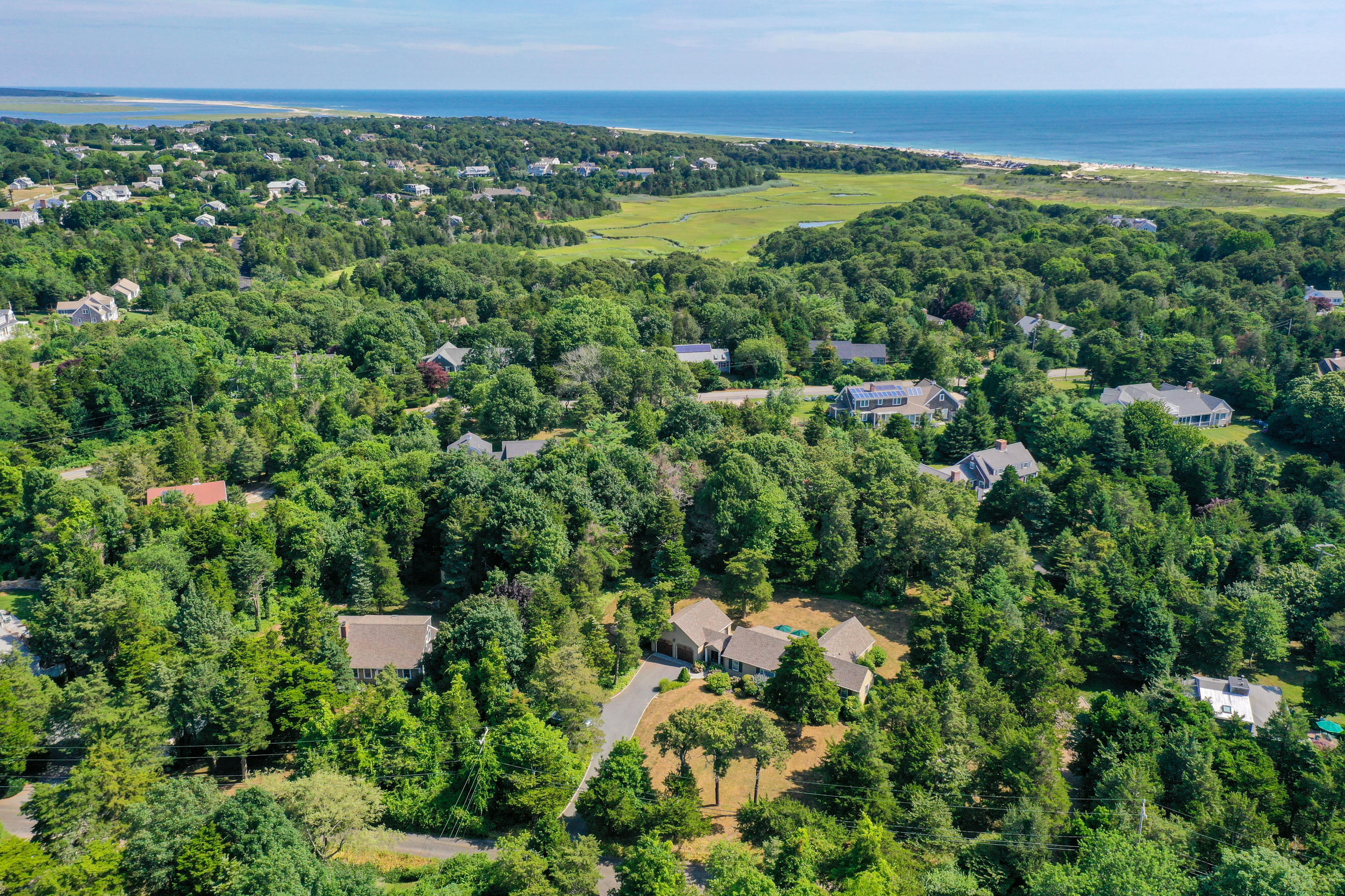 18 Sparrowhawk Road Orleans, MA 02653 - Photo 42 of 43 a view of a city with lush green forest