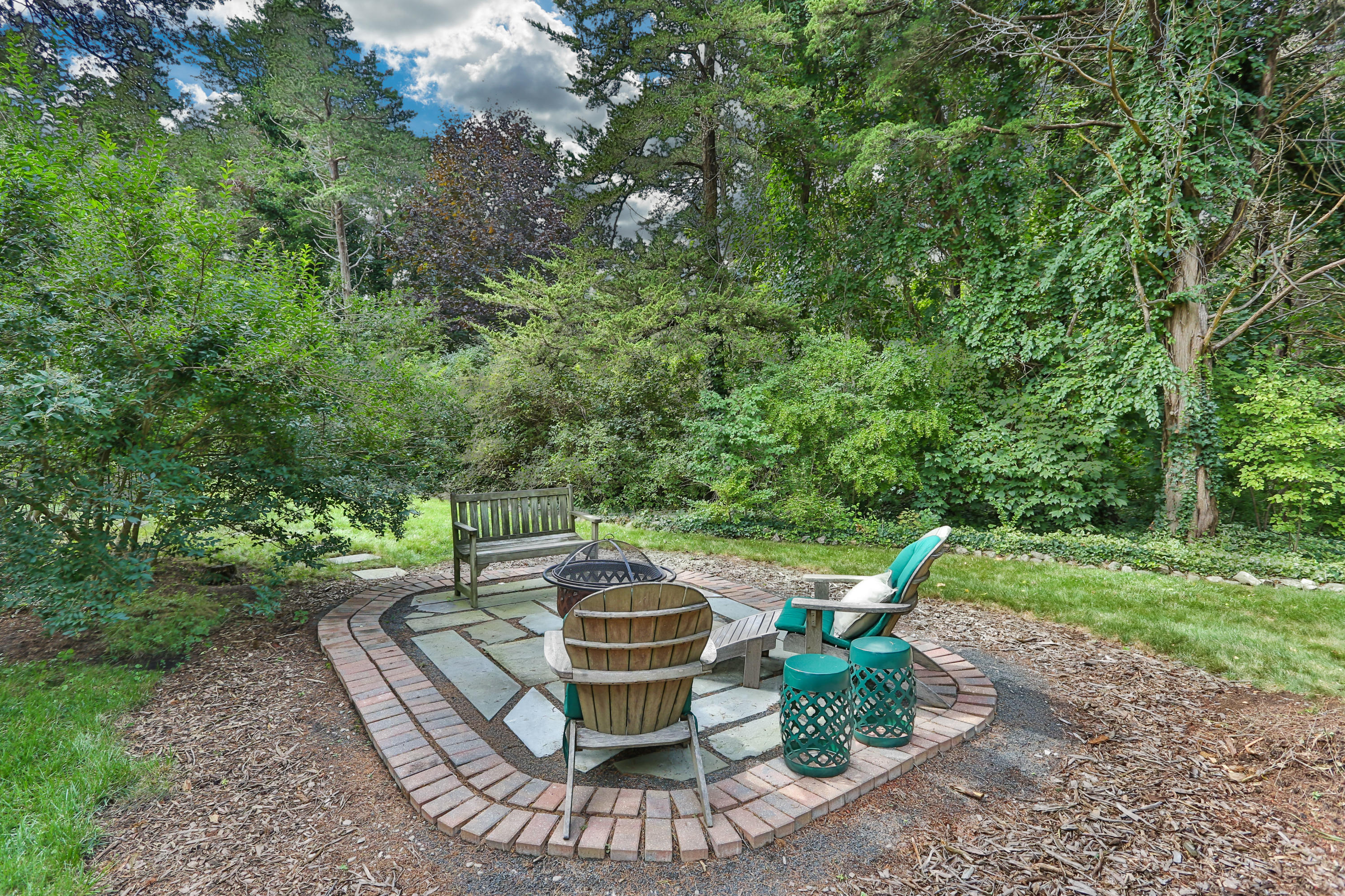 18 Sparrowhawk Road Orleans, MA 02653 - Photo 6 of 43 a view of a fire pit and a fire pit