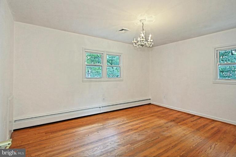 821 Snider Lane Silver Spring, MD 20905 - Photo 15 of 26 Master Bedroom w wood floors