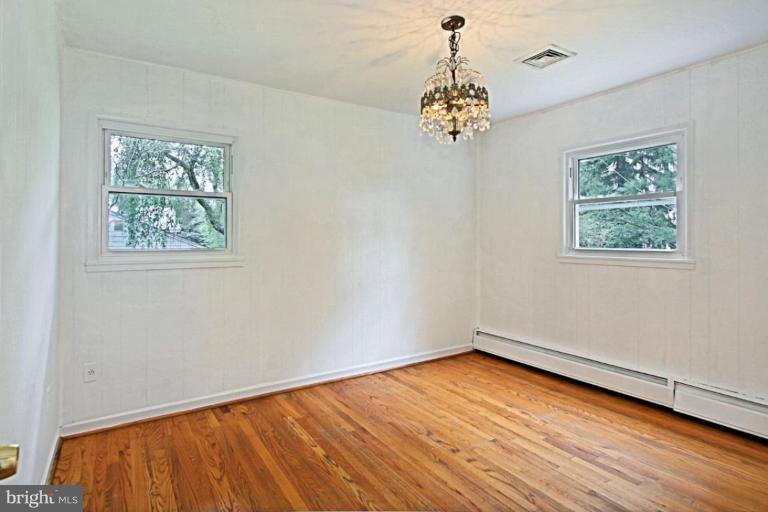 821 Snider Lane Silver Spring, MD 20905 - Photo 24 of 26 Second Bedroom w wood floors