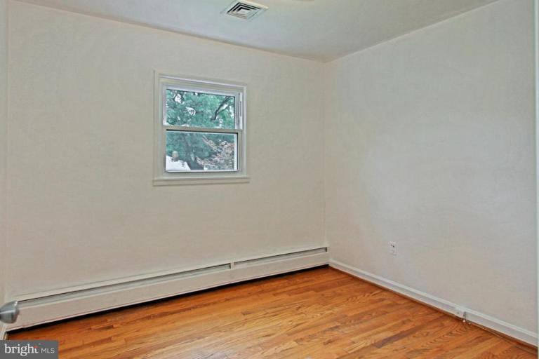 821 Snider Lane Silver Spring, MD 20905 - Photo 25 of 26 Third Bedroom w wood floors