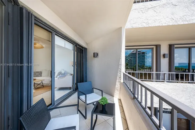 a view of a porch with furniture