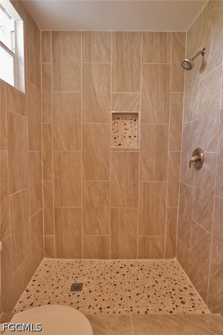 11 California Road Lehigh Acres, FL 33936 - Photo 12 of 19 a view of a bathroom shower