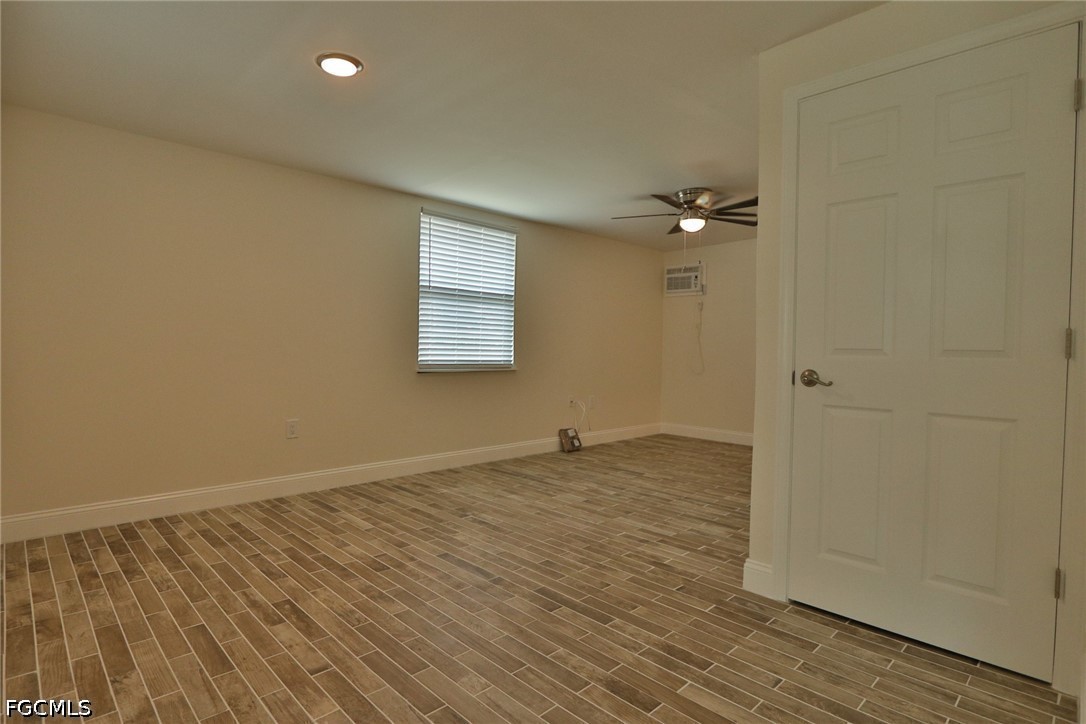 11 California Road Lehigh Acres, FL 33936 - Photo 14 of 19 a view of an empty room with a window