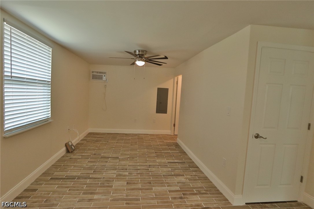11 California Road Lehigh Acres, FL 33936 - Photo 15 of 19 a view of an empty room with a window