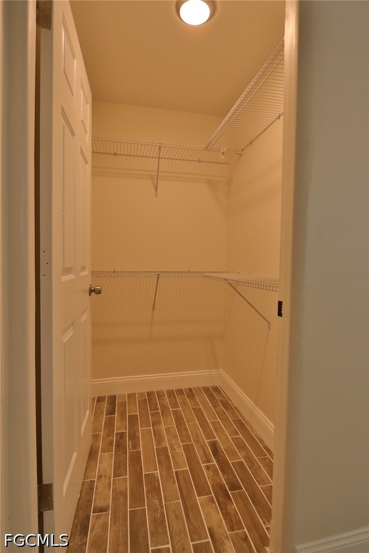 11 California Road Lehigh Acres, FL 33936 - Photo 16 of 19 a bathroom with a shower