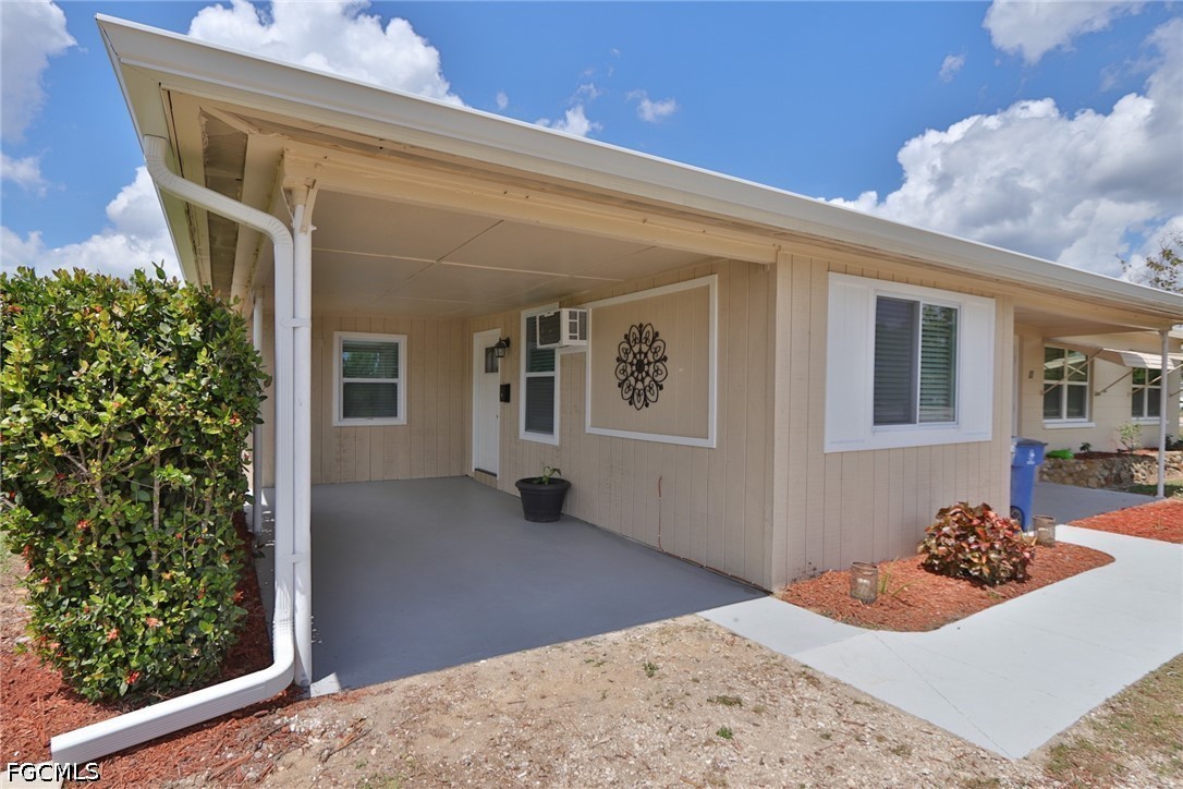 11 California Road Lehigh Acres, FL 33936 - Photo 2 of 19 a view of a bedroom