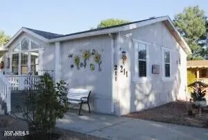 a front view of a house with yard