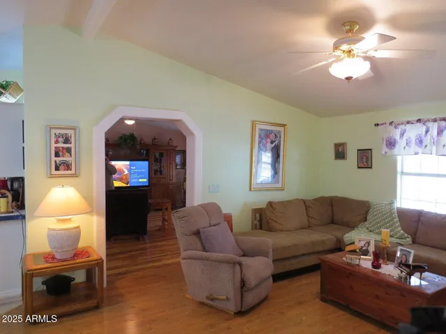 a bathroom with a sink a mirror and a shower