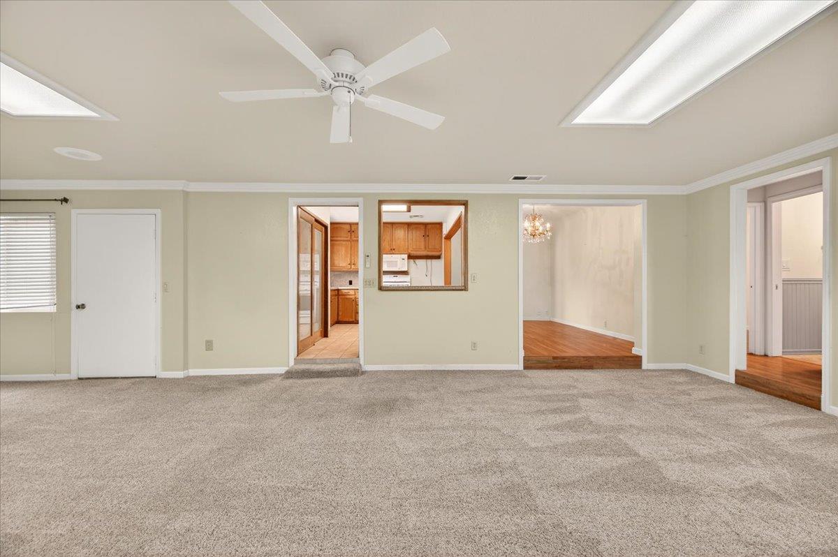 311 South K Street Madera, CA 93637 - Photo 15 of 46 an empty room with windows and closet