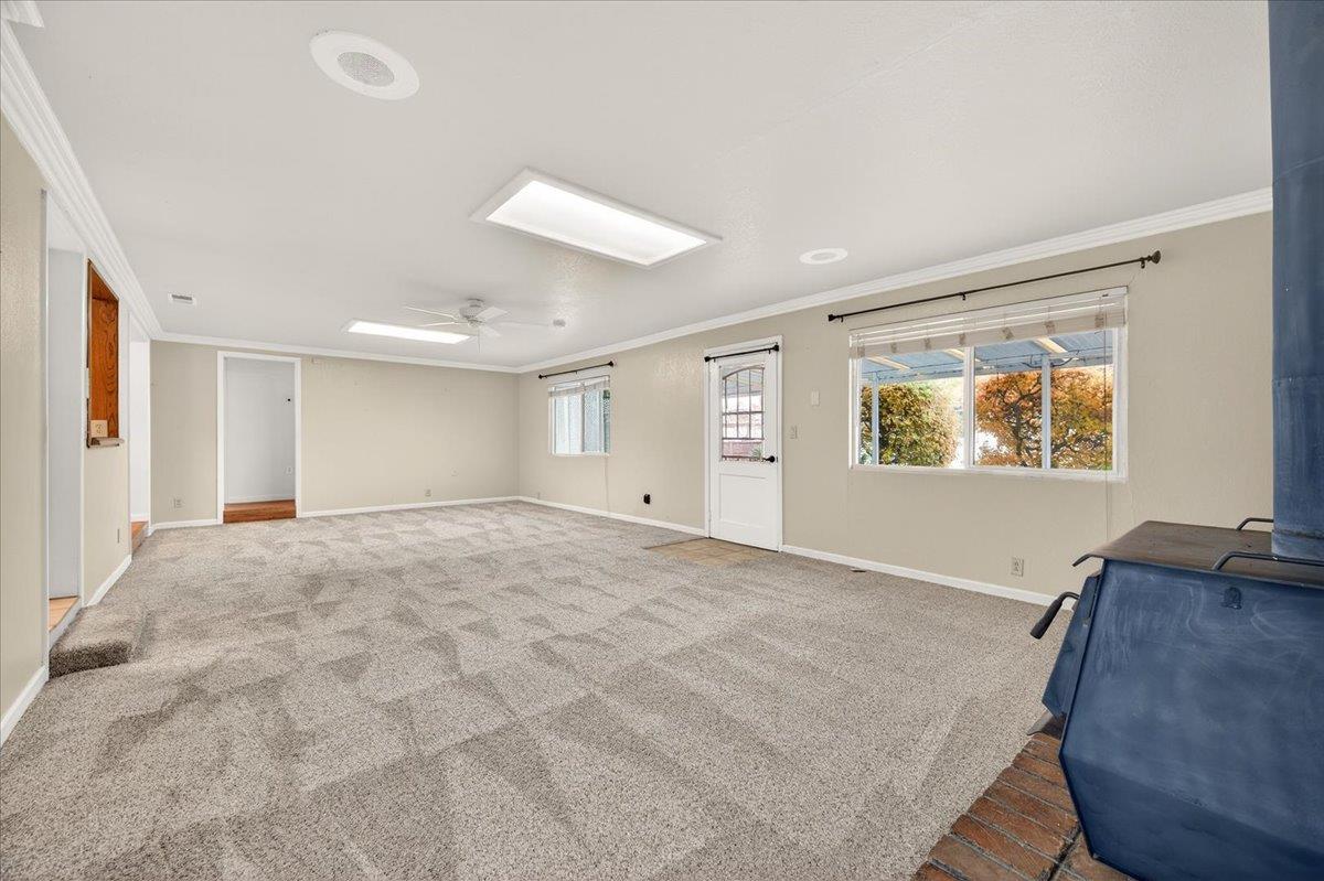 311 South K Street Madera, CA 93637 - Photo 16 of 46 a view of an empty room with a window