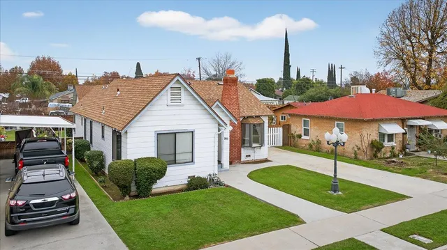 a house view with a garden space