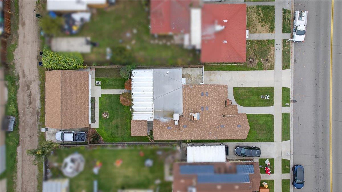 311 South K Street Madera, CA 93637 - Photo 5 of 46 an aerial view of a house with a yard