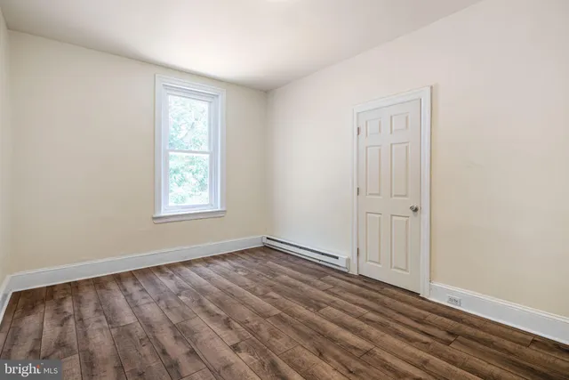 an empty room with window