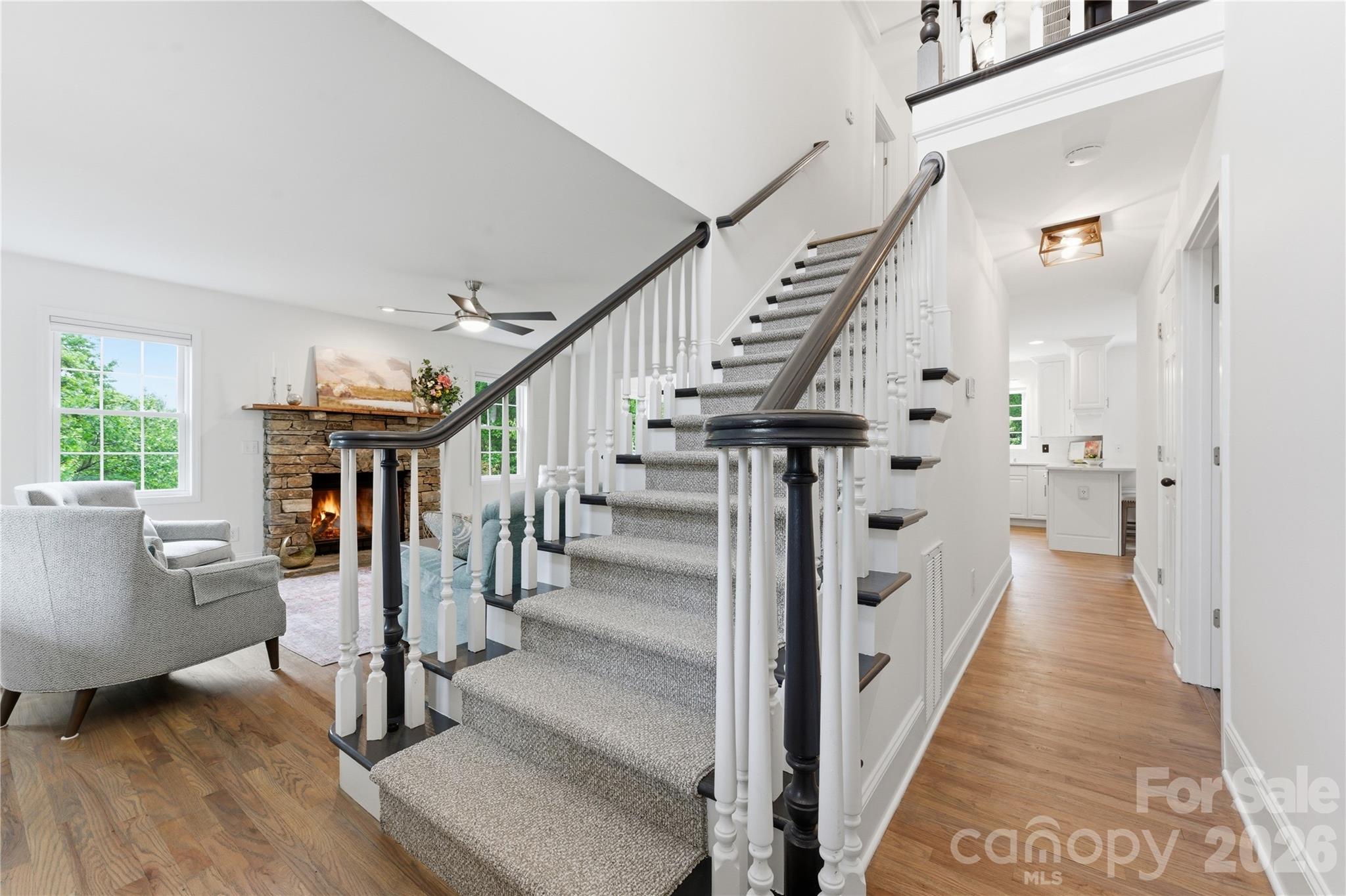 15 Raccoon Point Canton, NC 28716 - Photo 26 of 48 a view of entryway with wooden floor and stairs