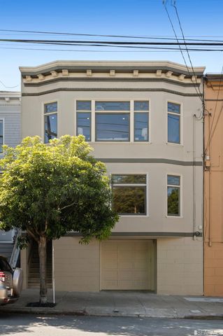 a view of a house with a garage
