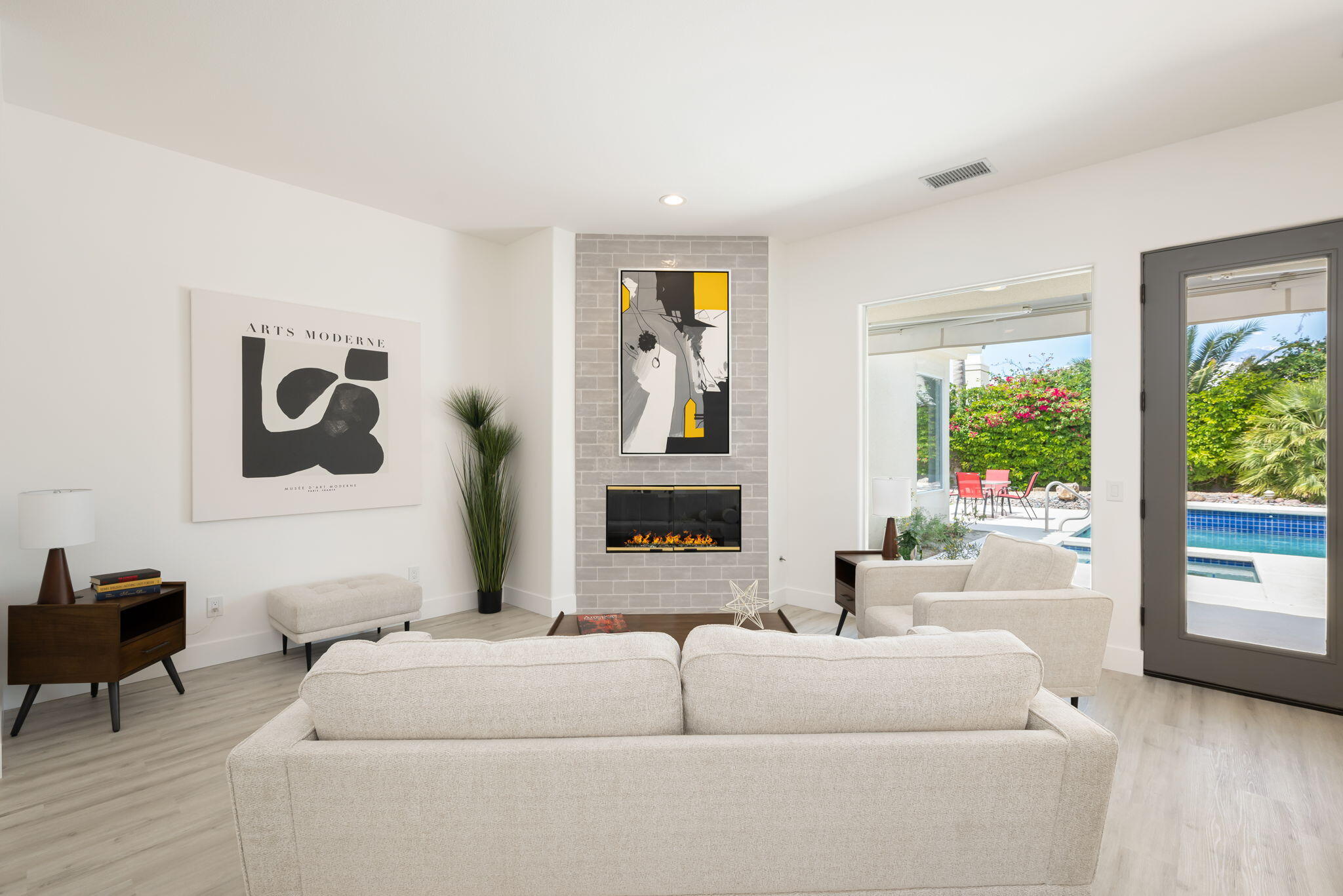 3 King Edward Court Rancho Mirage, CA 92270 - Photo 19 of 57 a living room with furniture and a large window