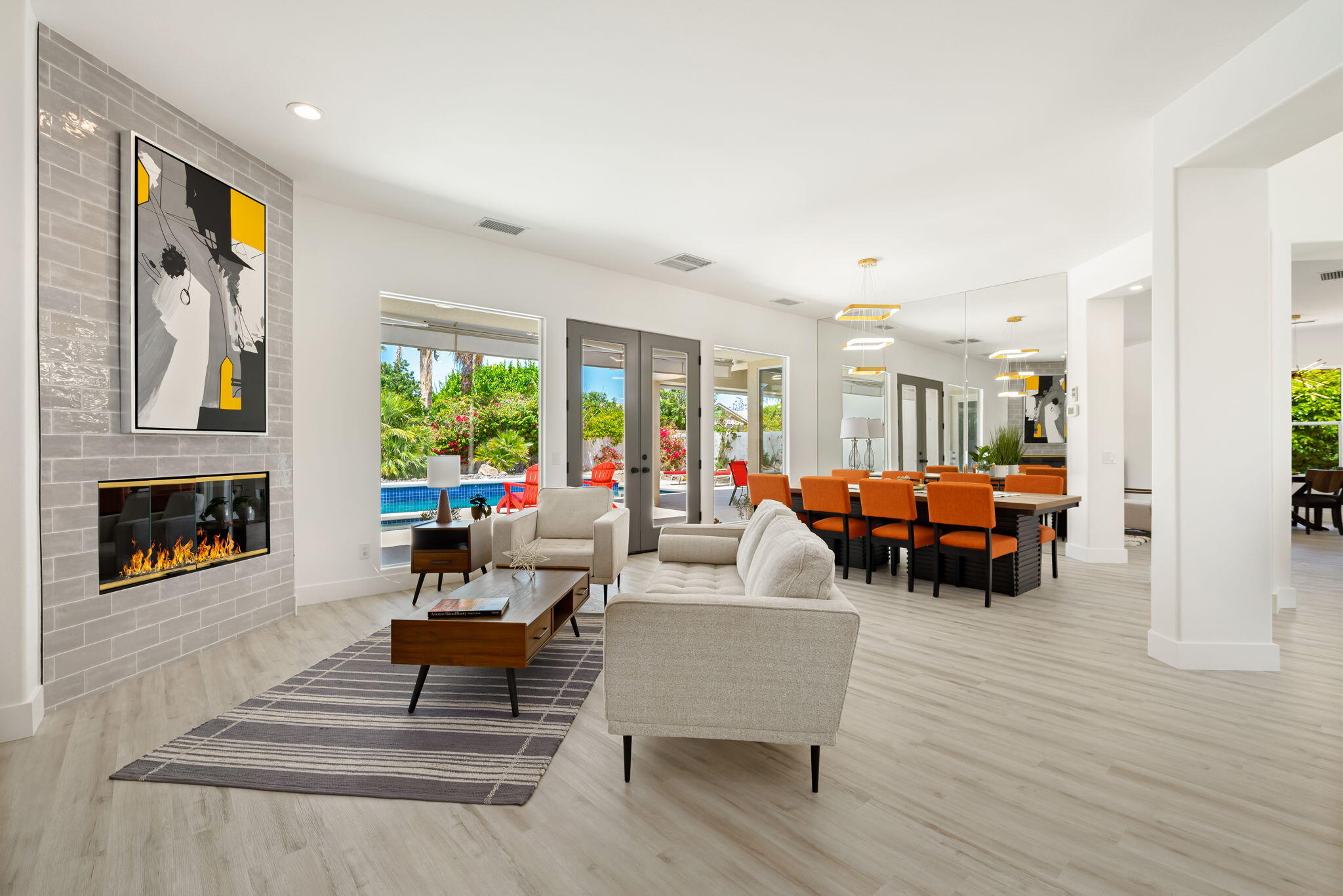 3 King Edward Court Rancho Mirage, CA 92270 - Photo 20 of 57 a living room with furniture and a fireplace