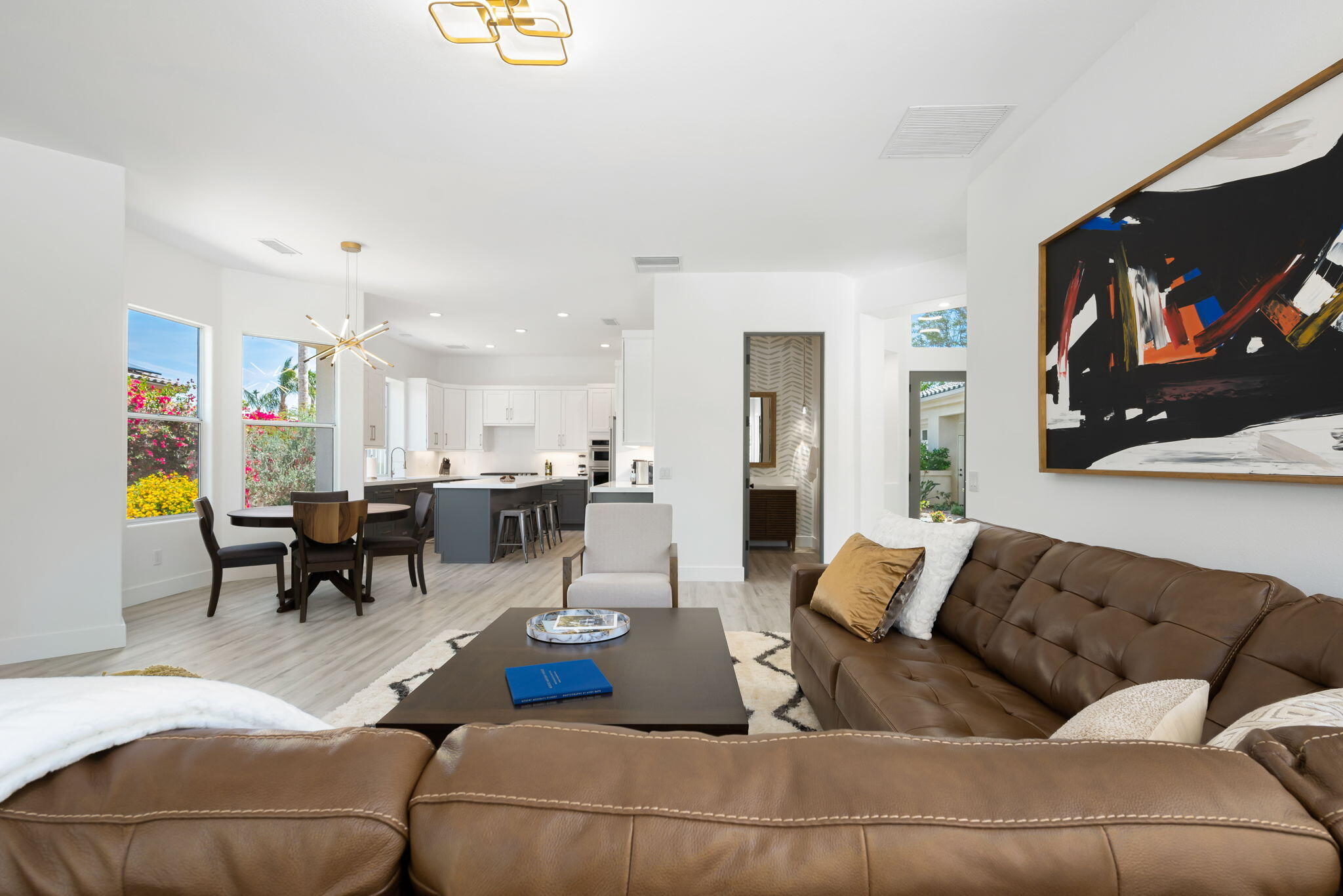 3 King Edward Court Rancho Mirage, CA 92270 - Photo 24 of 57 a living room with furniture and kitchen view