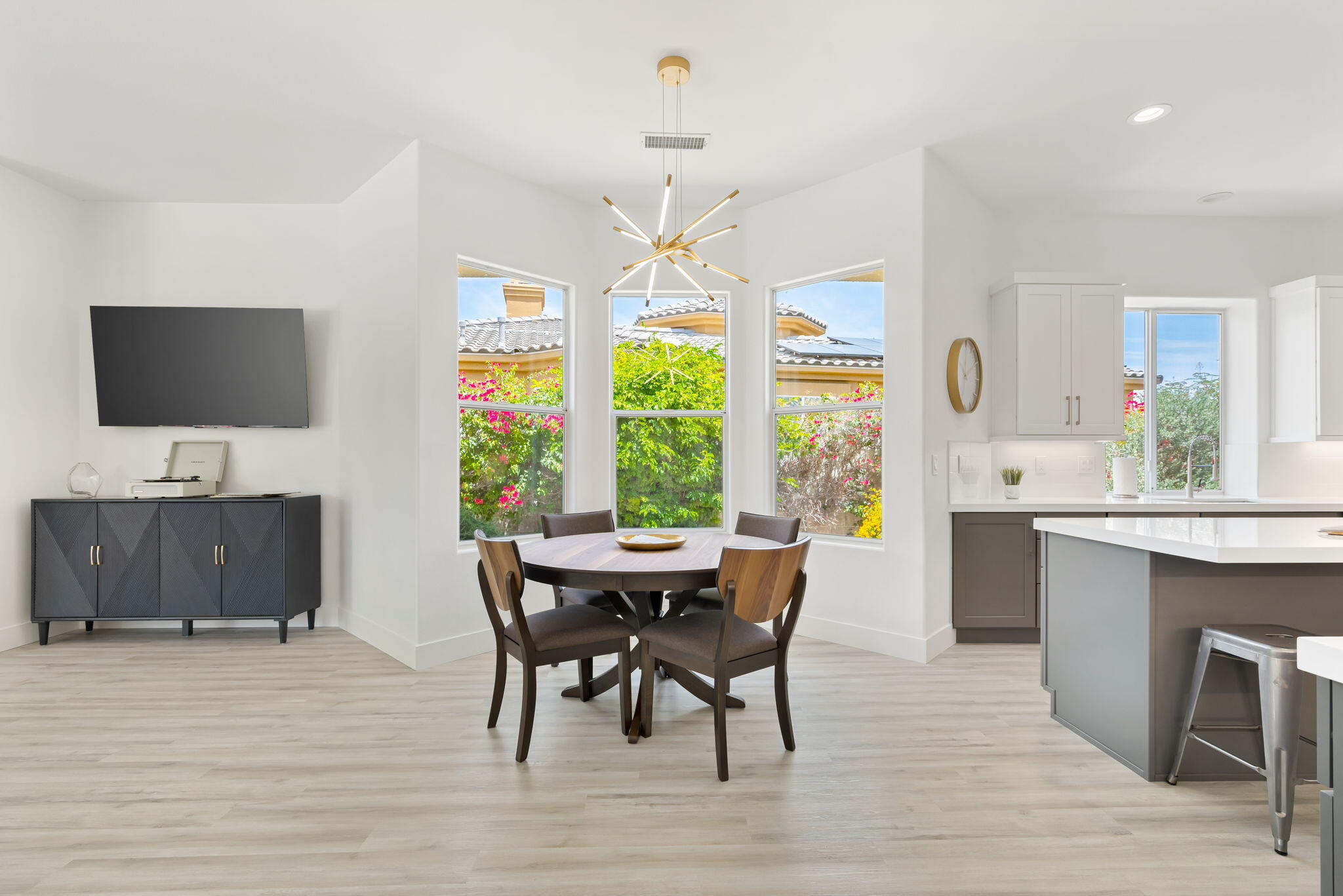 3 King Edward Court Rancho Mirage, CA 92270 - Photo 26 of 57 a view of a dining room with furniture window and wooden floor