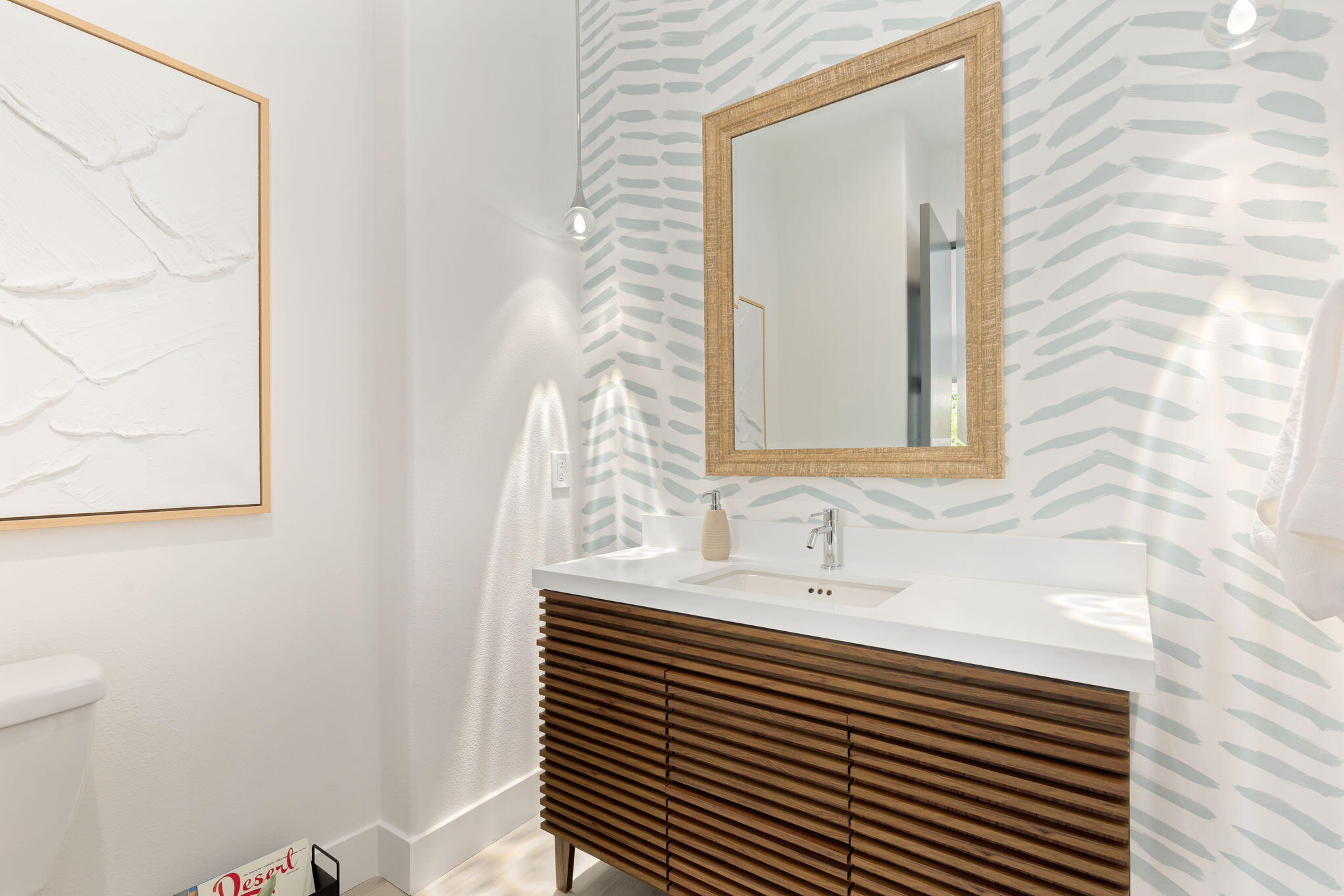 3 King Edward Court Rancho Mirage, CA 92270 - Photo 32 of 57 a bathroom with a sink and a mirror