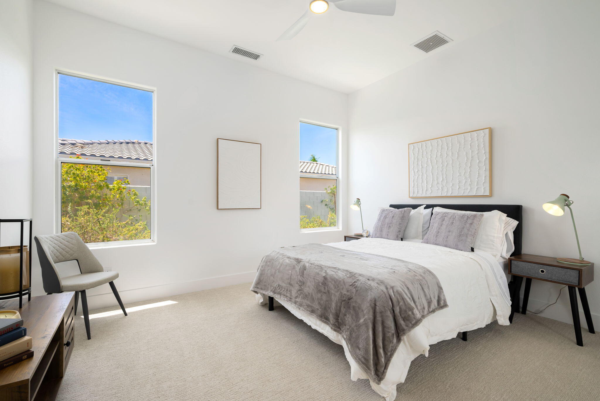 3 King Edward Court Rancho Mirage, CA 92270 - Photo 42 of 57 a bedroom with a bed chair and a window