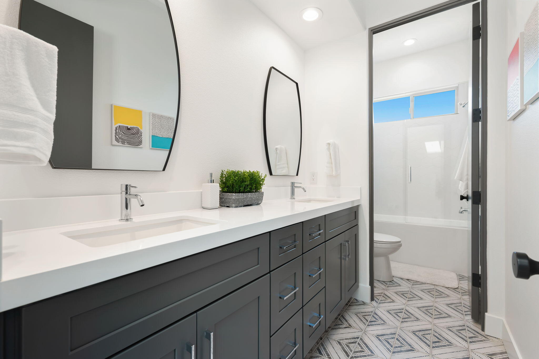 3 King Edward Court Rancho Mirage, CA 92270 - Photo 43 of 57 a bathroom with a double vanity sink mirror and toilet