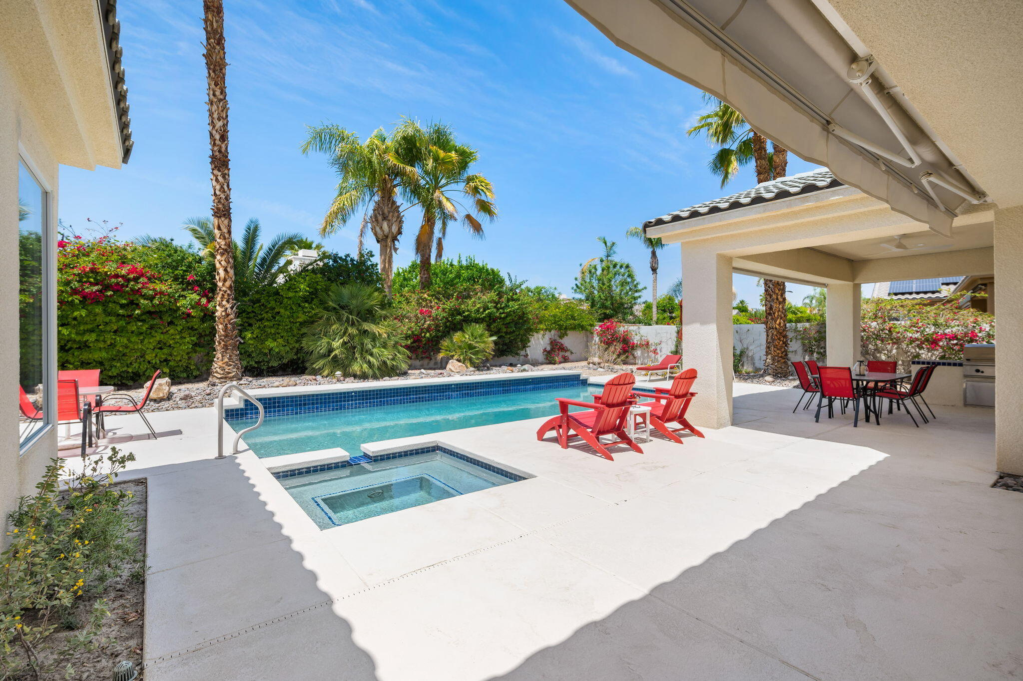 3 King Edward Court Rancho Mirage, CA 92270 - Photo 50 of 57 a view of a patio with table and chairs potted plants