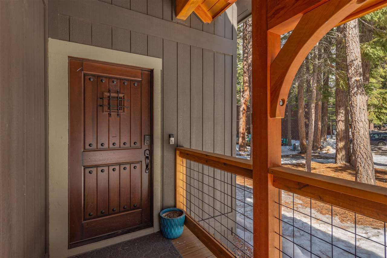 5641 Rhodesia Road Carnelian Bay, CA 96140 - Photo 2 of 21 a view of a door and a window