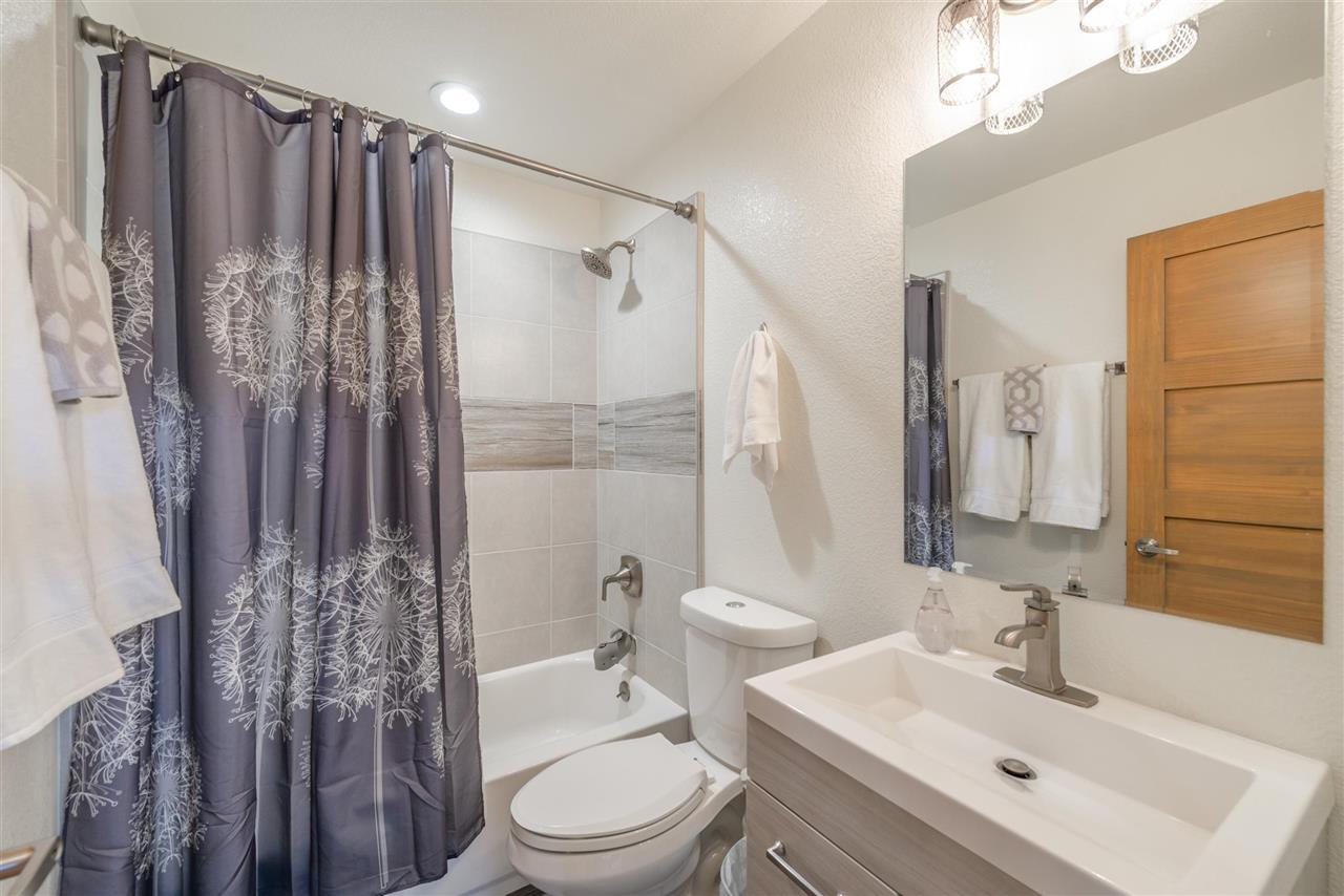 5641 Rhodesia Road Carnelian Bay, CA 96140 - Photo 11 of 21 a bathroom with a sink a toilet and shower