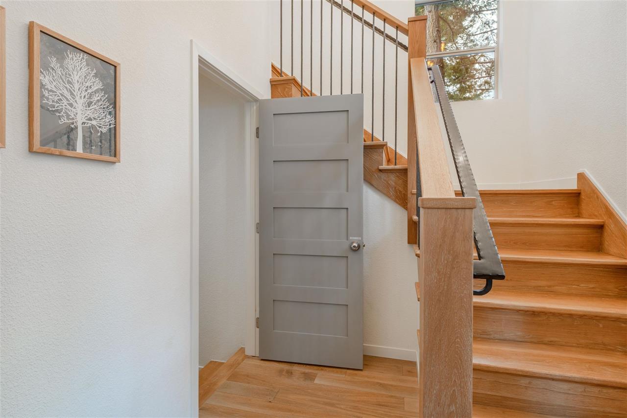 5641 Rhodesia Road Carnelian Bay, CA 96140 - Photo 3 of 21 a view of walk in closet with empty racks