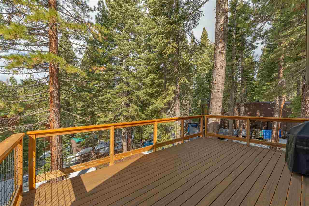 5641 Rhodesia Road Carnelian Bay, CA 96140 - Photo 9 of 21 a view of a balcony with wooden floor and fence