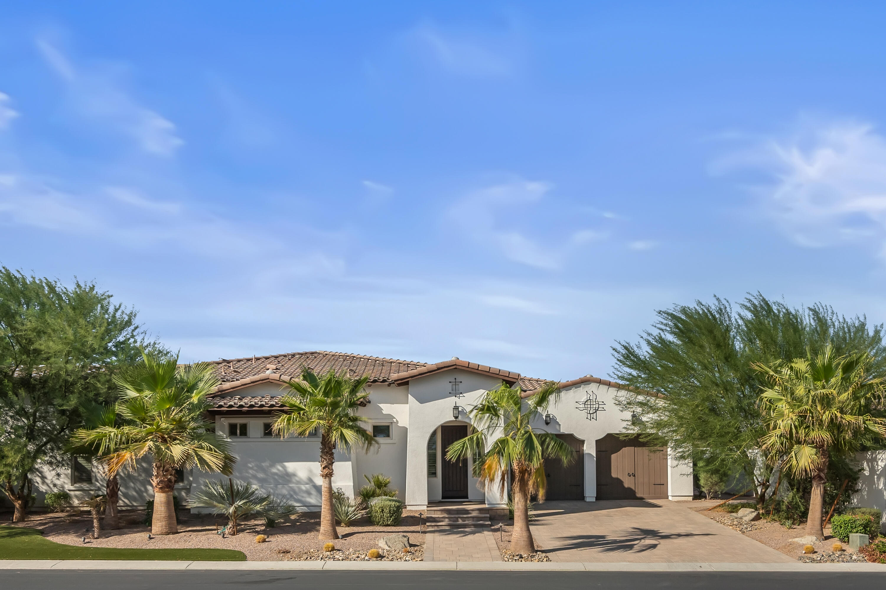 81402 Merv Griffin Way La Quinta, CA 92253 - Photo 1 of 1 a view of a food mall next to a road