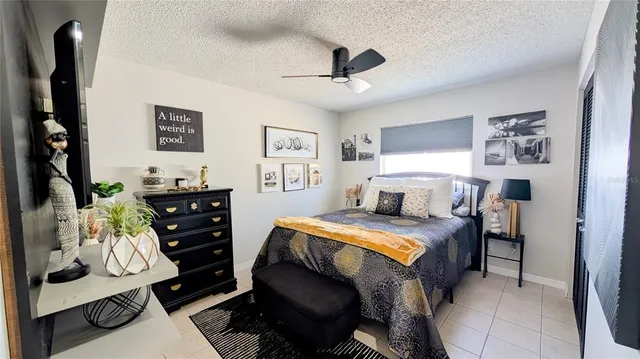 a bedroom with a bed and a closet